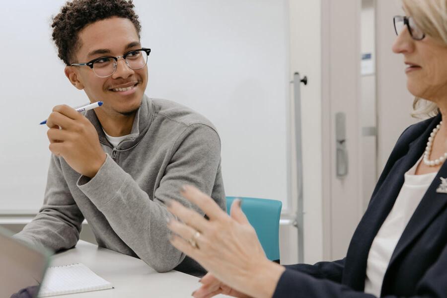 Mathematics student engages in classroom discussion.